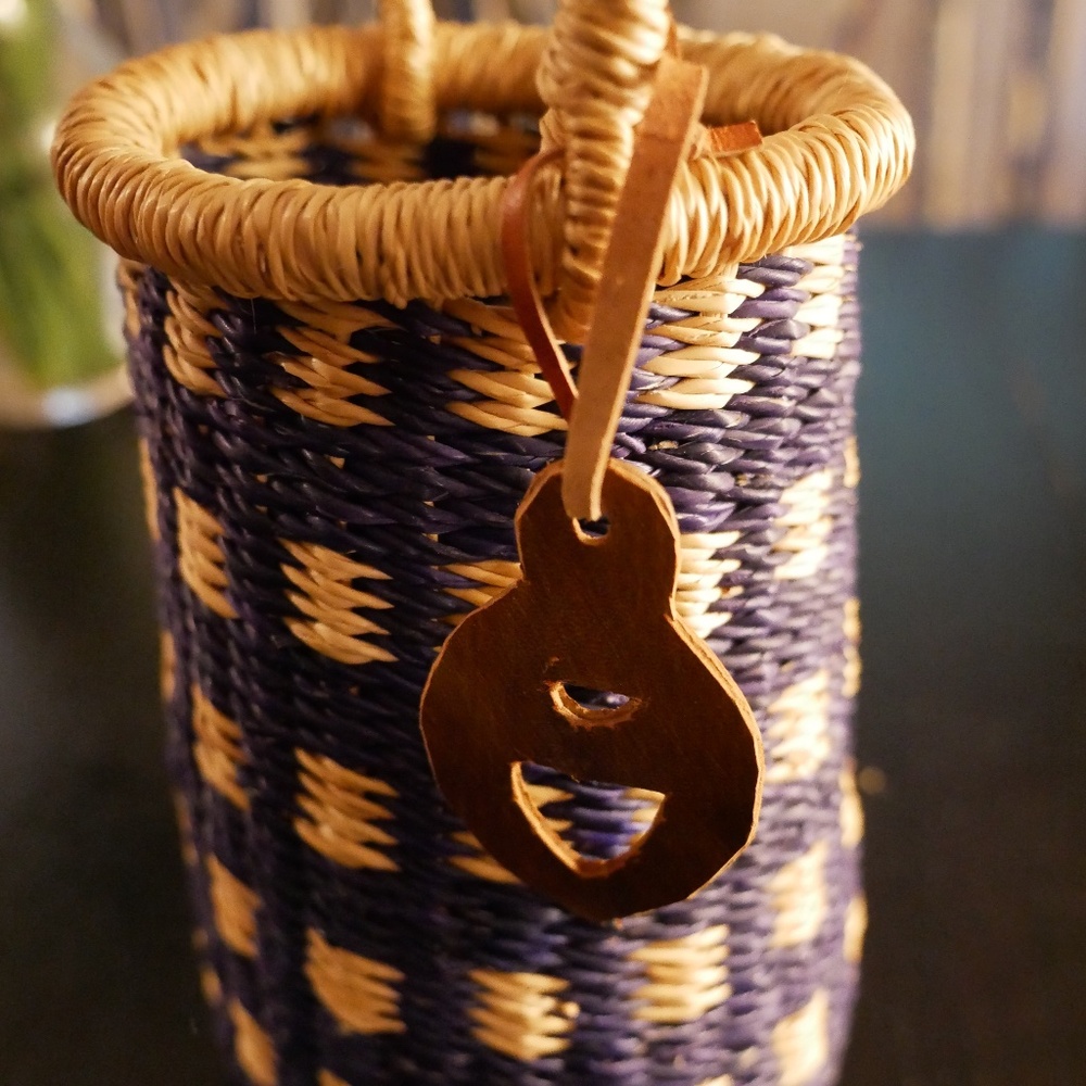 Woven basket with handle